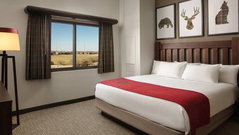 The bed in the accessible Brown Bear Suite